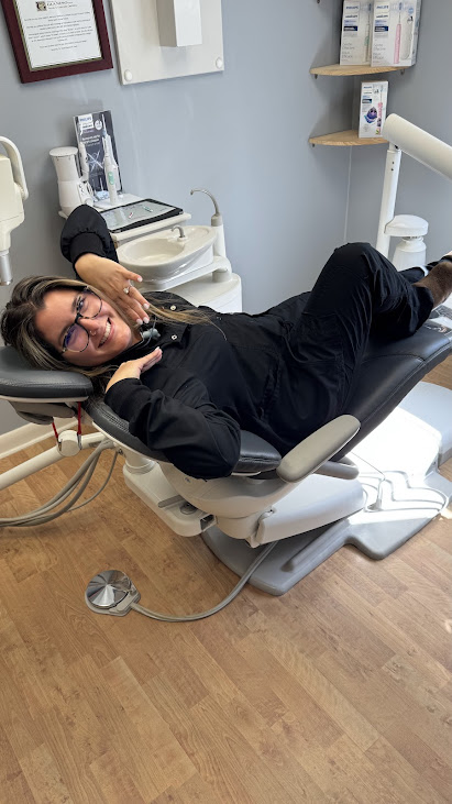 Dental team member relaxing in a treatment chair, representing special offers in Lunenburg